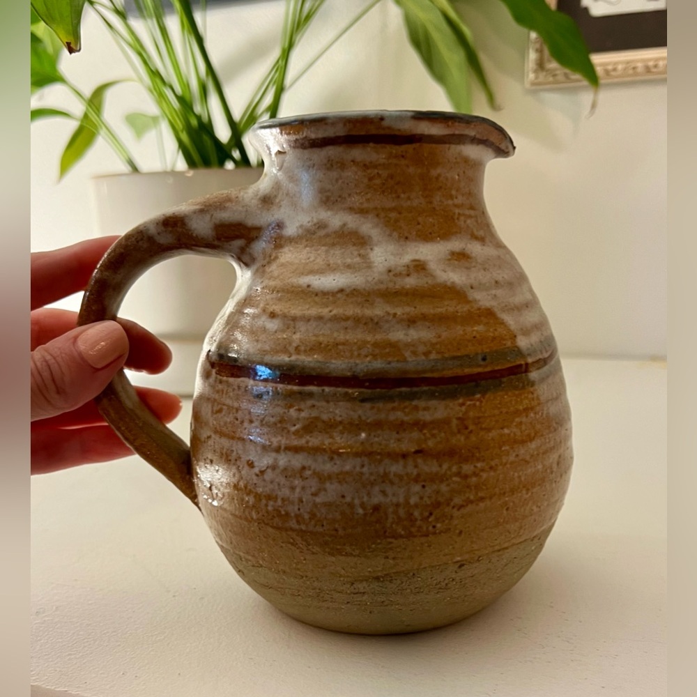 Handmade pottery jug carafe with beautiful earthtones